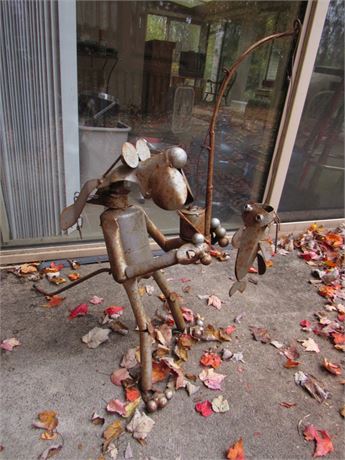 Metal Art Sculpture: Dog Catching a Fish