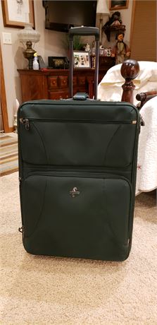 Suitcase with garment bag and toiletry bag
